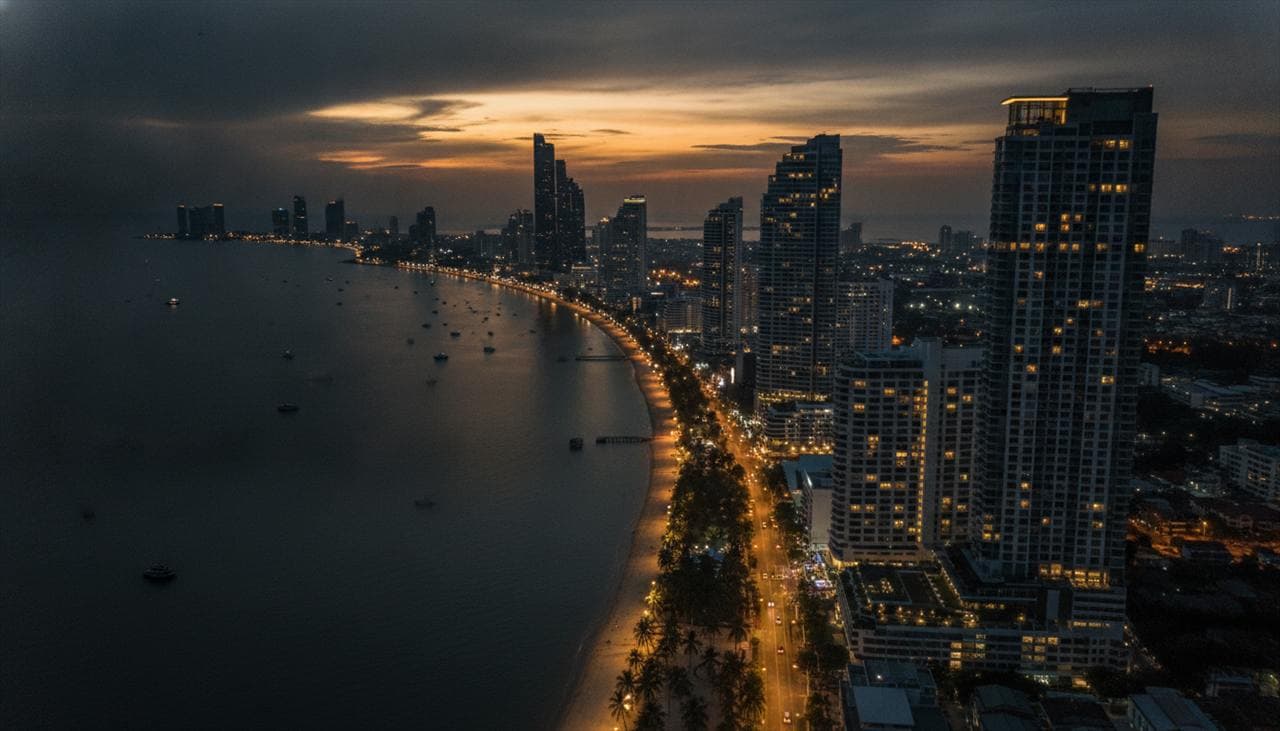 Aerial view of Pattaya bay and its coastal skyline at dusk